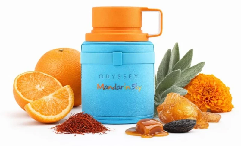 Frasco de Armaf Odyssey Mandarin Sky con naranjas, azafrán, salvia, cempasúchil, caramelo y haba tonka
